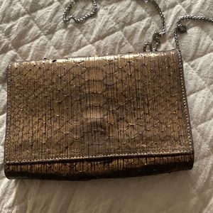 Carlos Falchi metallic snakeskin bag. Bronze like color with dark silver chain